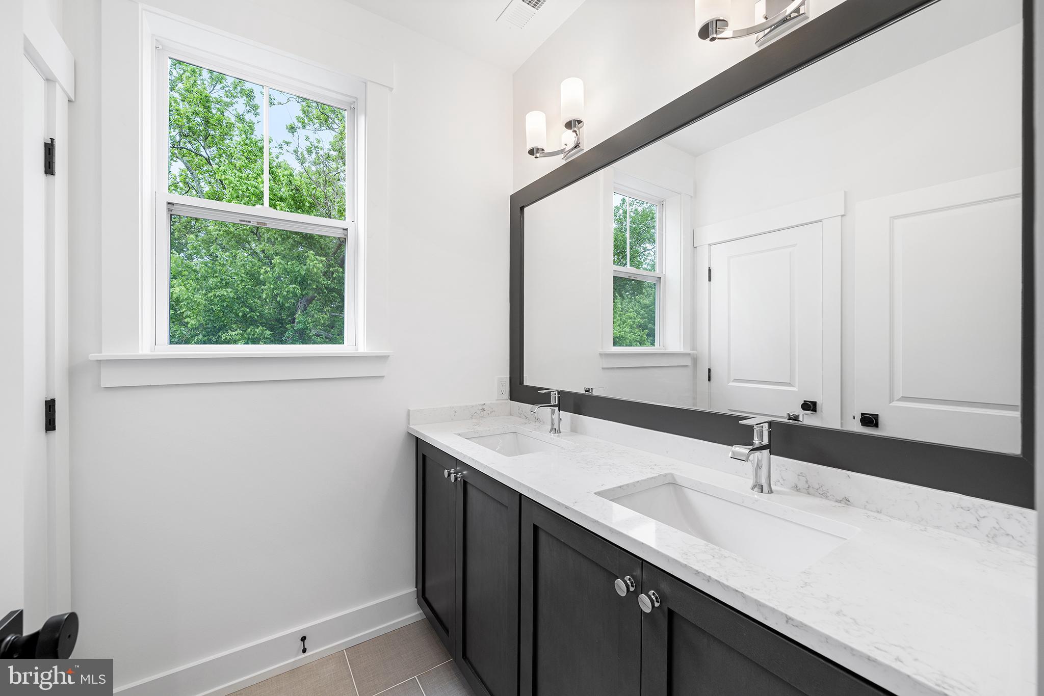 1815 Lot 2b Yost Road Blue Bell, PA 19422 - Photo 33 of 55 a bathroom with a sink and a window