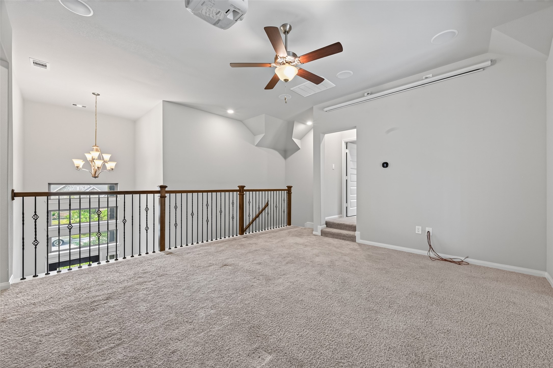 17323 Grand Canyon Road Conroe, TX 77302 - Photo 30 of 40 Natural light from the foyer and family room windows.