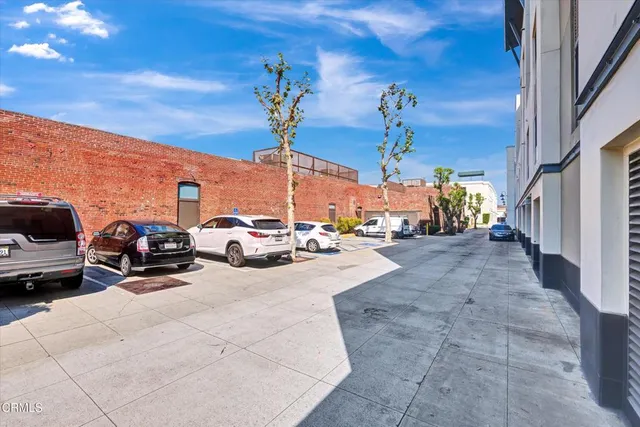 a view of a building with a street