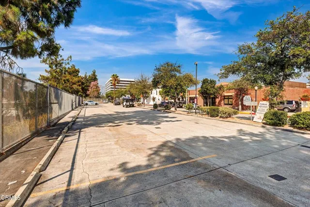 a city street lined with tall buildings