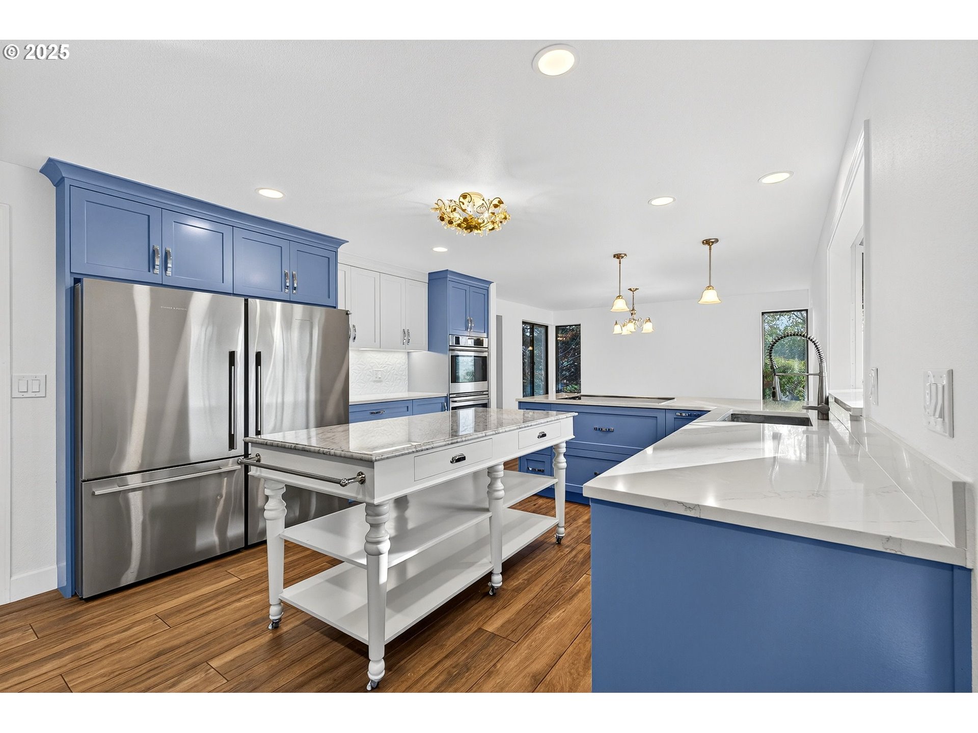 14595 Southwest 144th Avenue Portland, OR 97224 - Photo 11 of 43 a kitchen with counter top space cabinets and stainless steel appliances