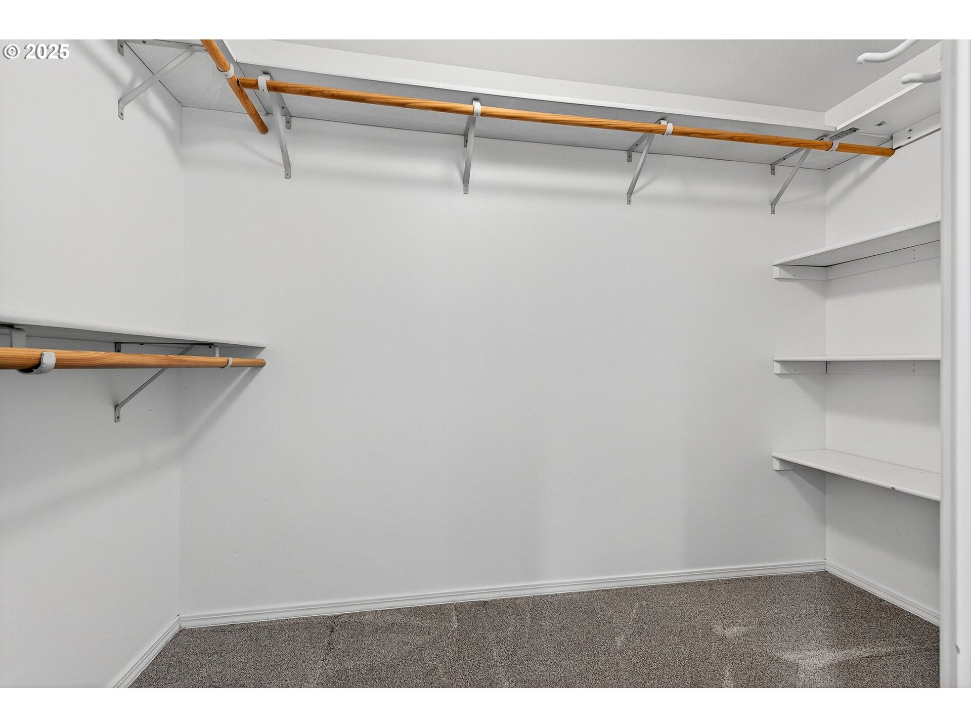 14595 Southwest 144th Avenue Portland, OR 97224 - Photo 27 of 43 a view of a room with racks on the wall