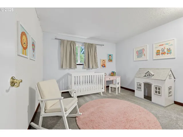 a view of empty room with ceiling fan
