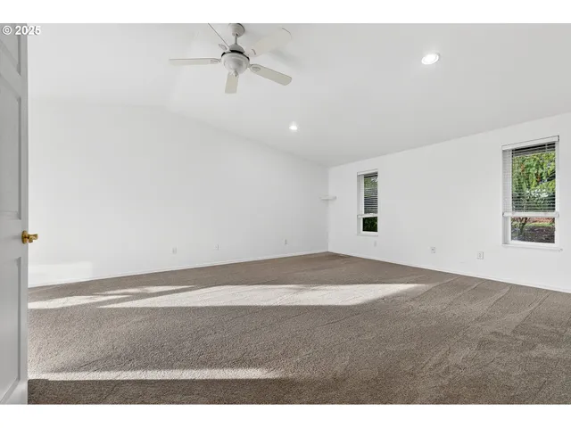 a utility room with sink dryer and washer