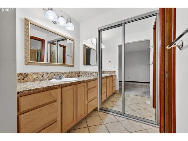 a bathroom with a shower and a toilet