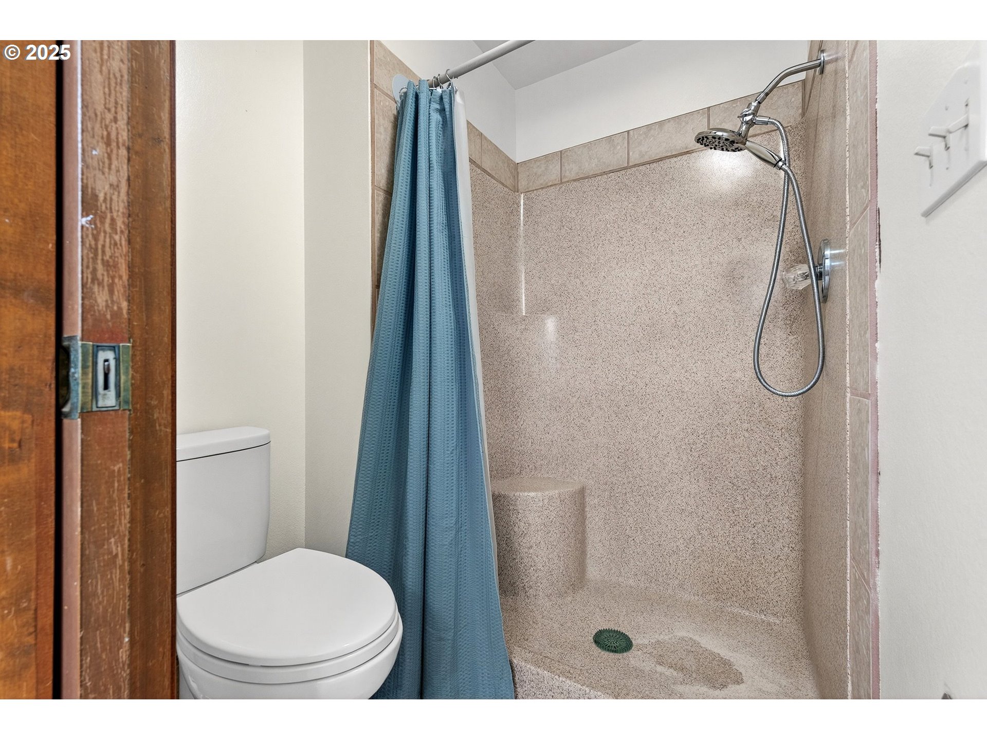 14595 Southwest 144th Avenue Portland, OR 97224 - Photo 36 of 43 a bathroom with a shower and a toilet