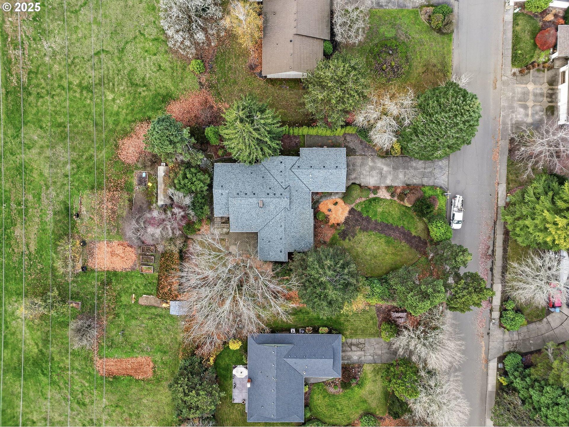 14595 Southwest 144th Avenue Portland, OR 97224 - Photo 38 of 43 an aerial view of a house with a yard
