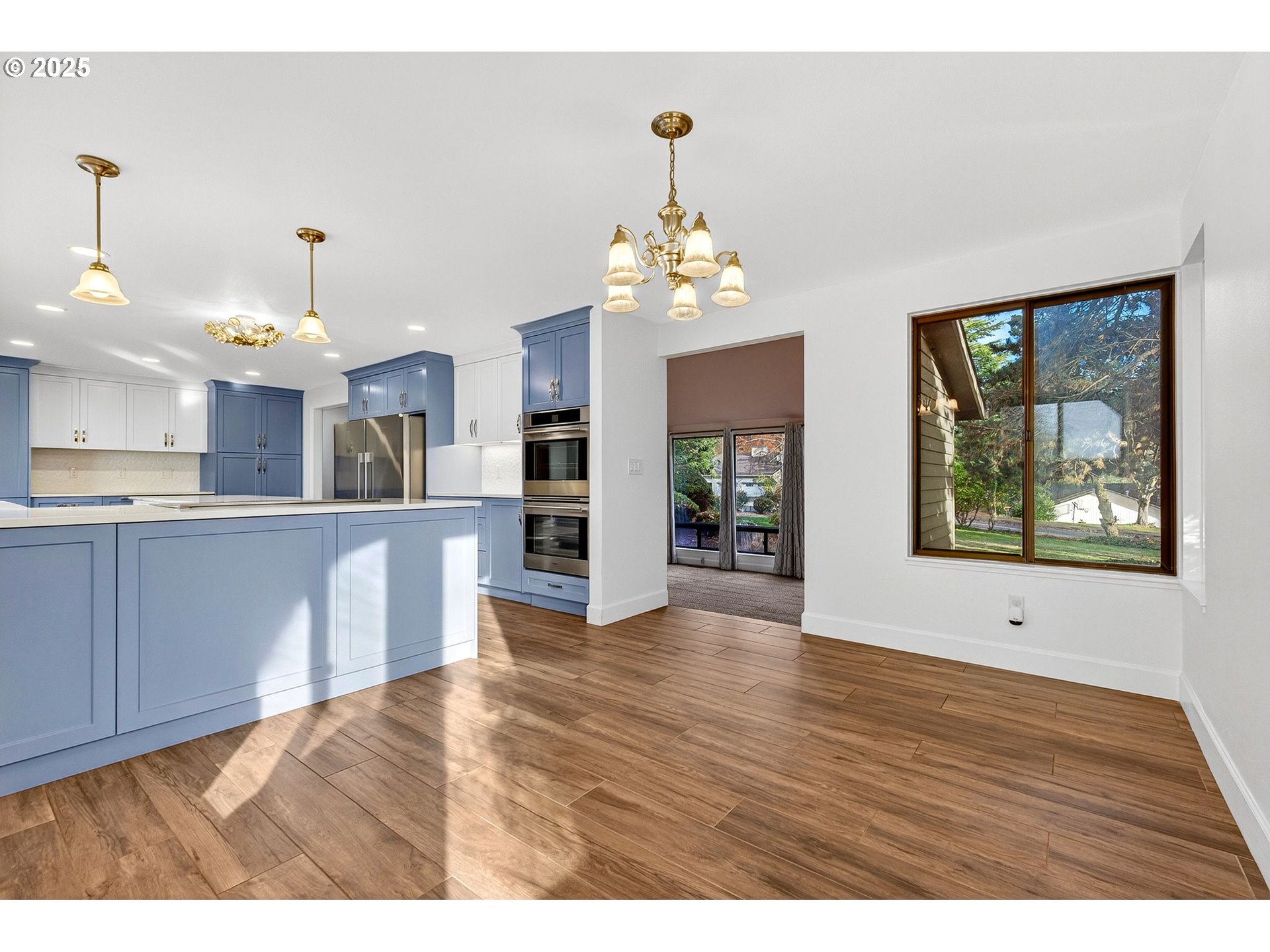 14595 Southwest 144th Avenue Portland, OR 97224 - Photo 9 of 43 a view interior of the kitchen and chandelier