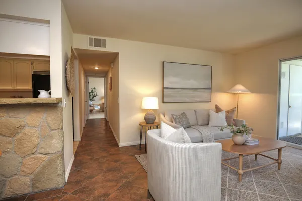 a living room with furniture and a couch