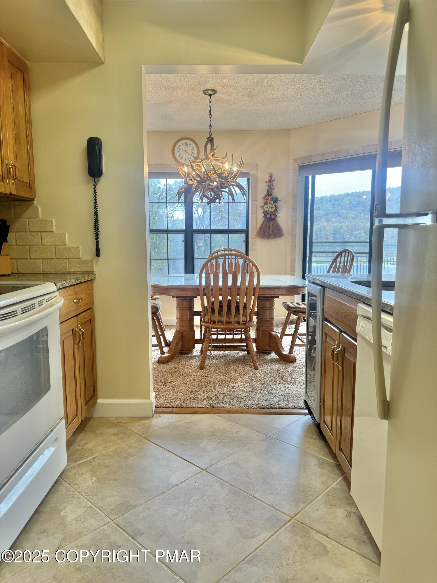 33 Midlake Drive, Unit 101 Lake Harmony, PA 18624 - Photo 26 of 39 a view of a hallway with washer and dryer