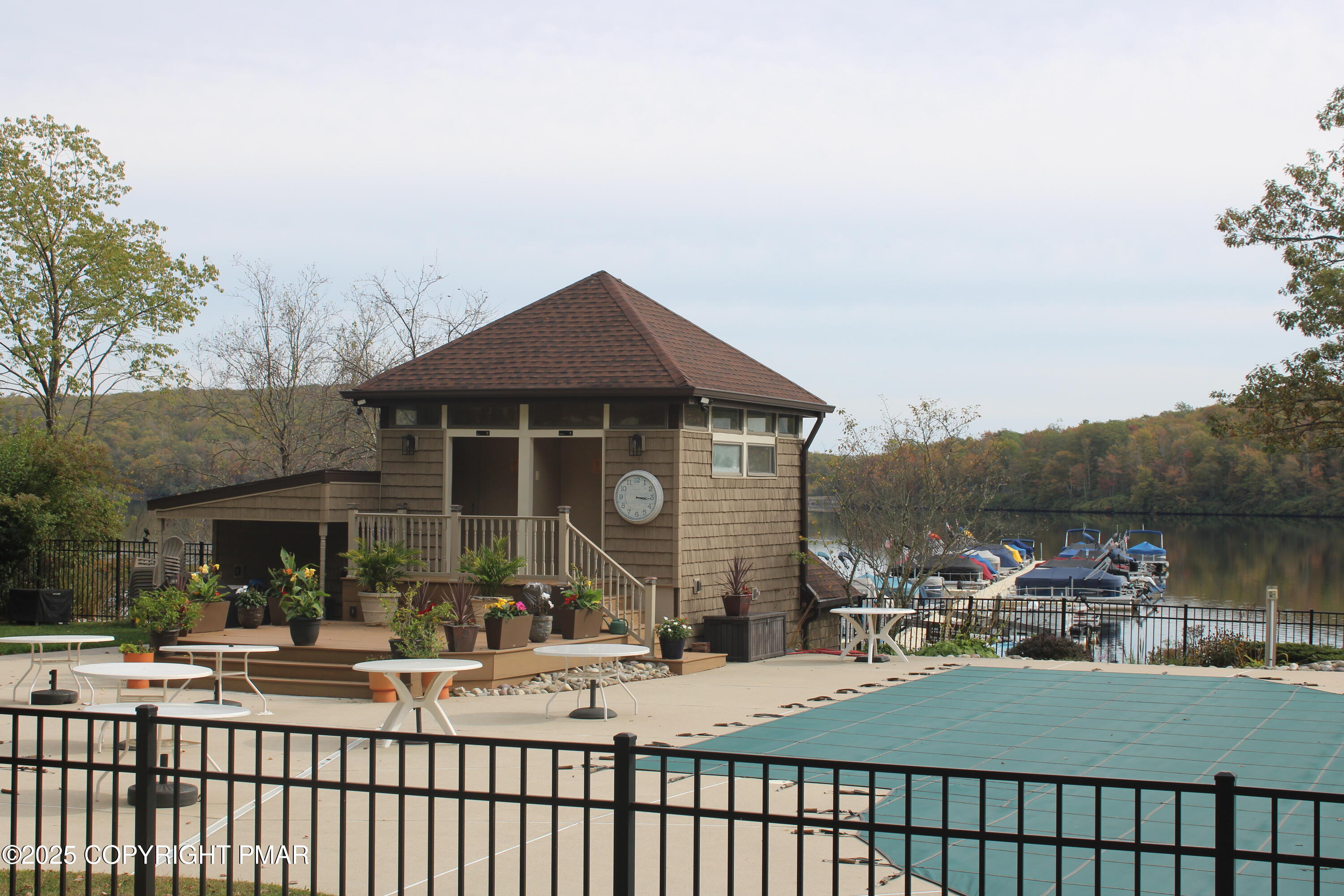 33 Midlake Drive, Unit 101 Lake Harmony, PA 18624 - Photo 33 of 39 a view of a house with sitting area and furniture