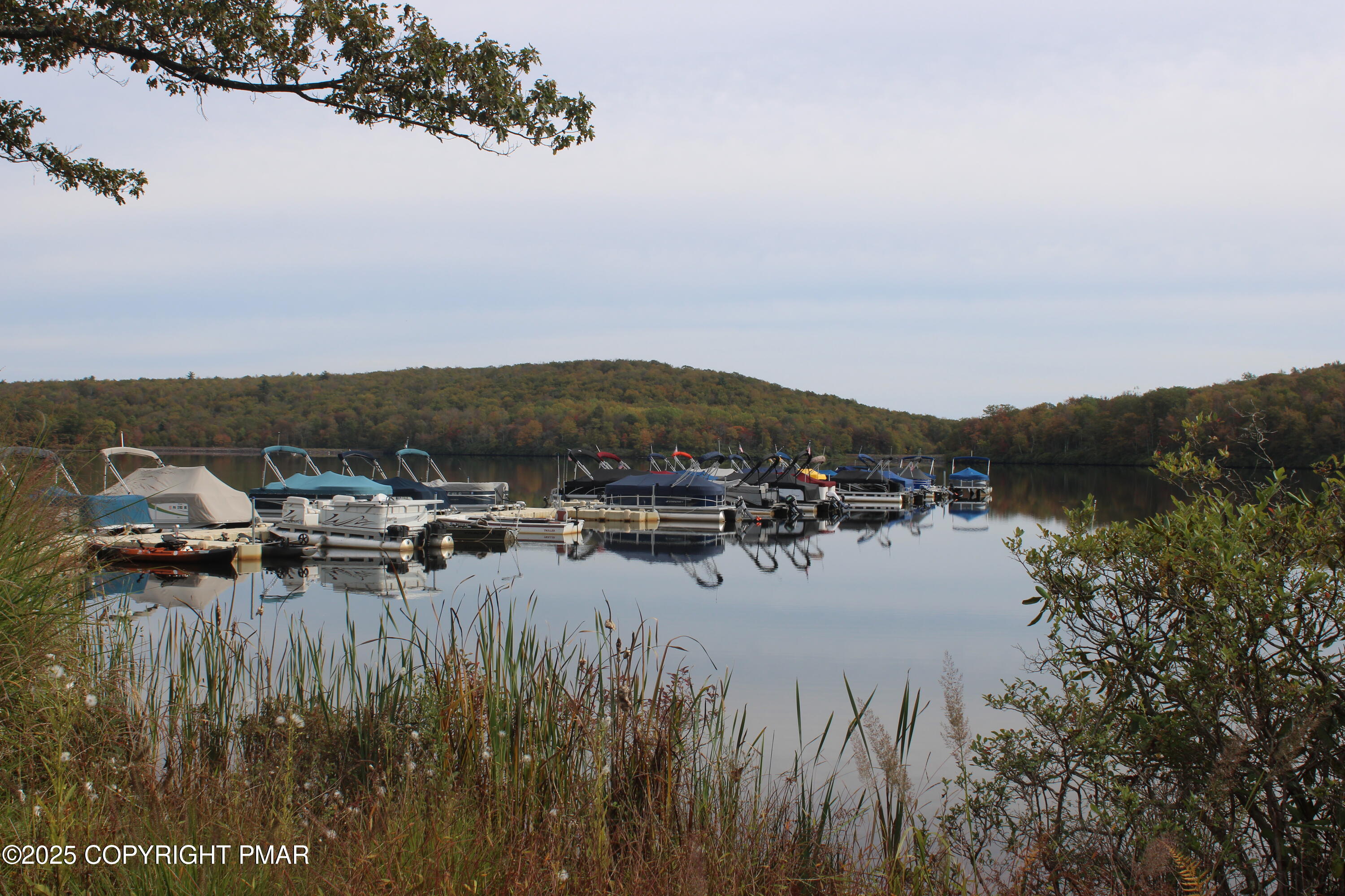 33 Midlake Drive, Unit 101 Lake Harmony, PA 18624 - Photo 37 of 39 a view of river covered by trees and houses