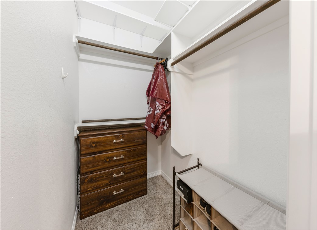 1198 Jones-Butler Road, Unit 1806 College Station, TX 77840 - Photo 12 of 26 a view of walk in closet with clothes