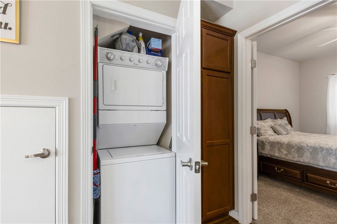 1198 Jones-Butler Road, Unit 1806 College Station, TX 77840 - Photo 19 of 26 a utility room with dryer and washer