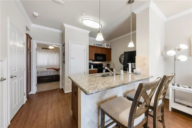 a view of a kitchen and dining room