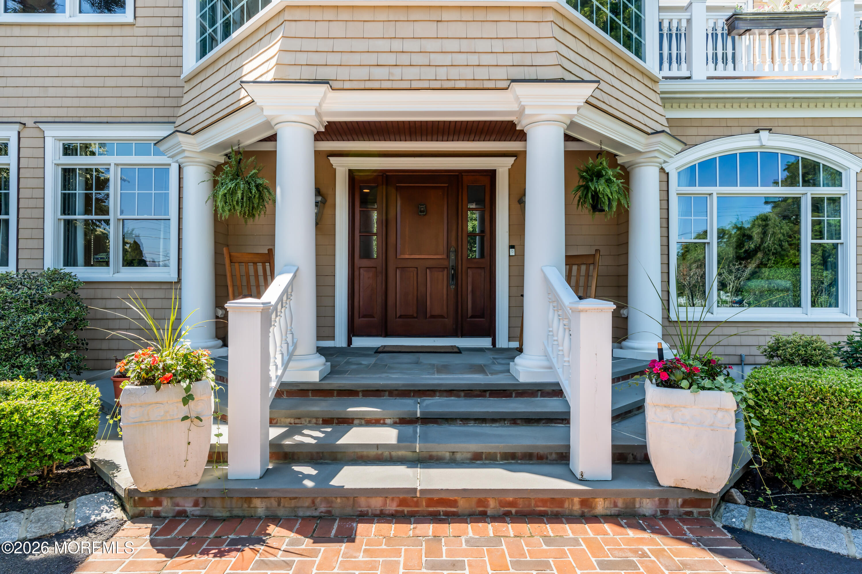 600 Little Silver Point Road Little Silver, NJ 07739 - Photo 5 of 55 a front view of a house with plants