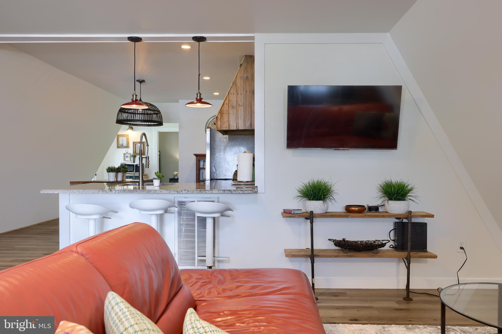 1770 Windy Hill Road Lancaster, PA 17602 - Photo 2 of 43 a living room with furniture and a flat screen tv