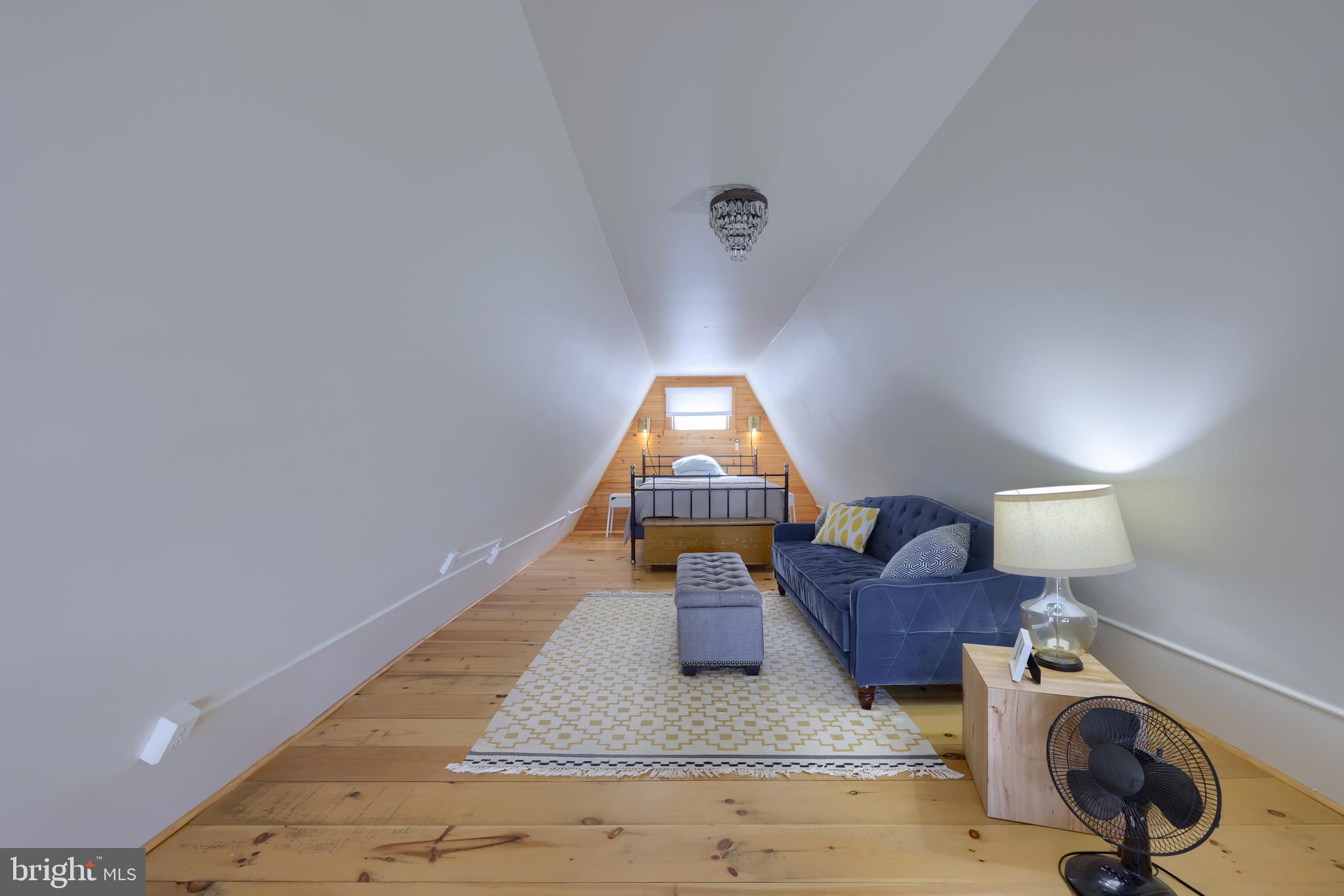 1770 Windy Hill Road Lancaster, PA 17602 - Photo 27 of 43 a living room with furniture and a wooden floor