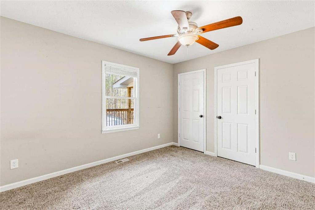 616 Wells Road Buchanan, GA 30113 - Photo 22 of 44 a view of an empty room with a window