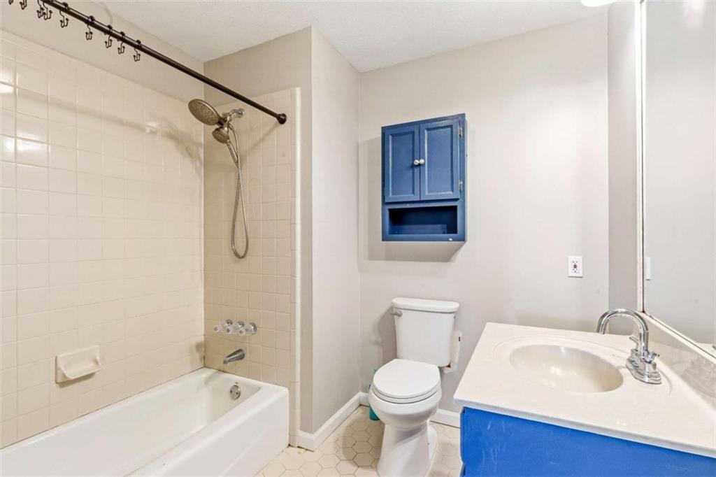 616 Wells Road Buchanan, GA 30113 - Photo 29 of 44 a bathroom with a sink toilet and shower