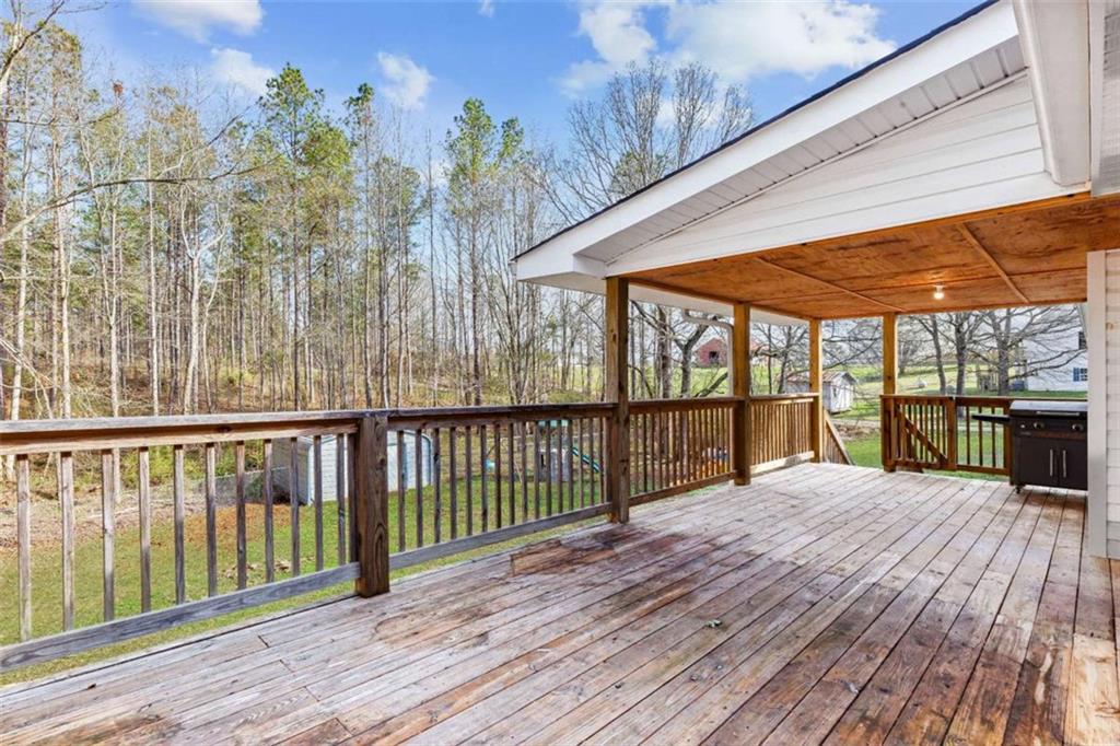 616 Wells Road Buchanan, GA 30113 - Photo 40 of 44 a view of balcony with wooden floor