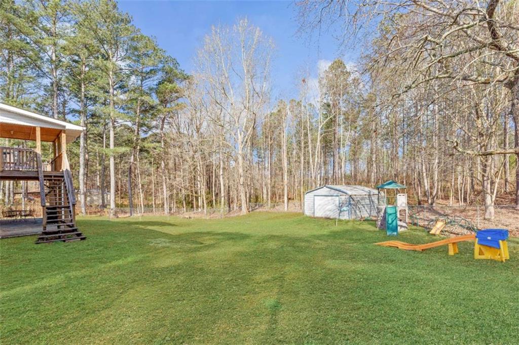 616 Wells Road Buchanan, GA 30113 - Photo 43 of 44 a view of a park with swings
