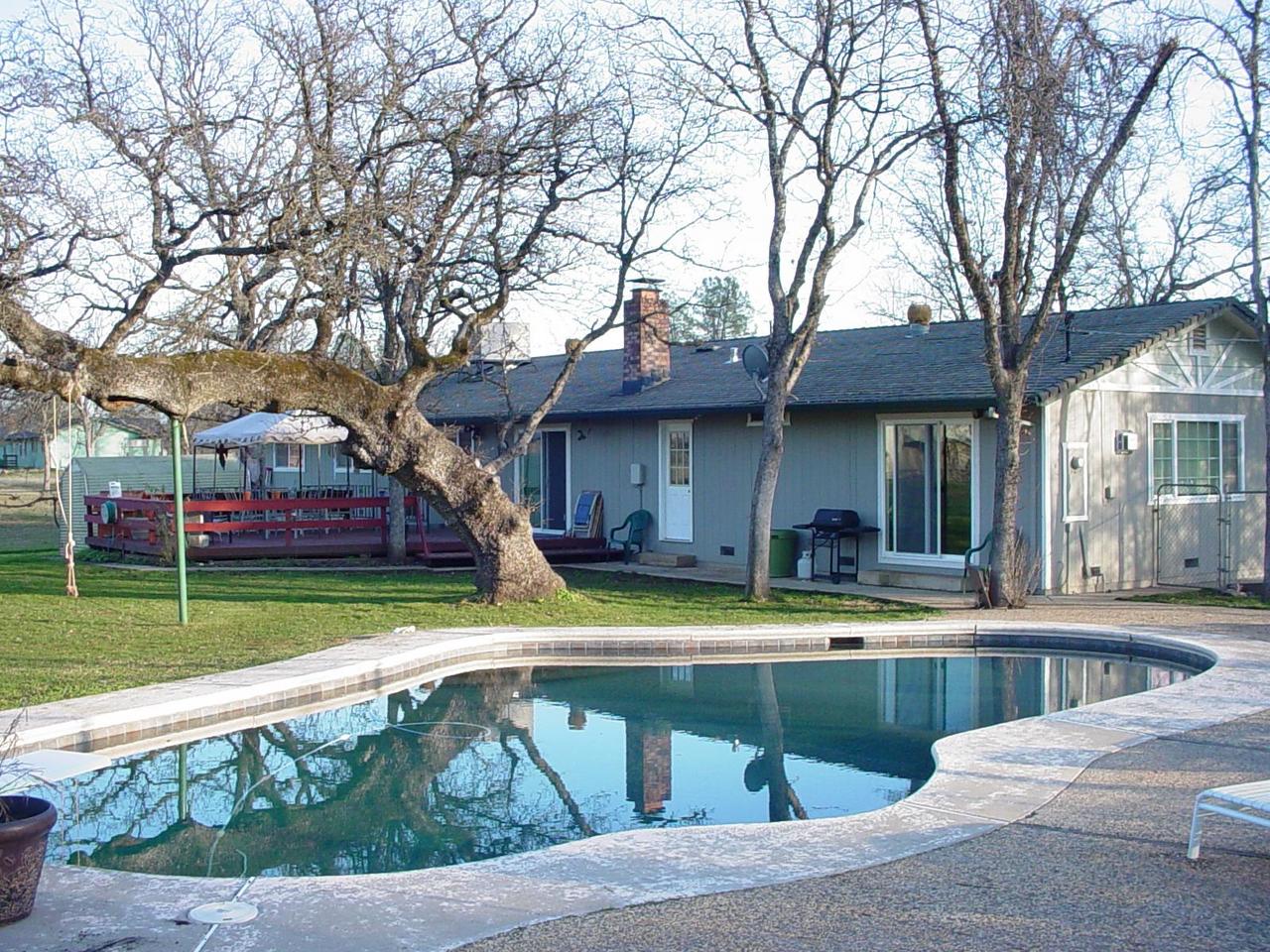 21066 Falling Leaf Road Redding, CA 96003 - Photo 3 of 9 Looking over pool towards home