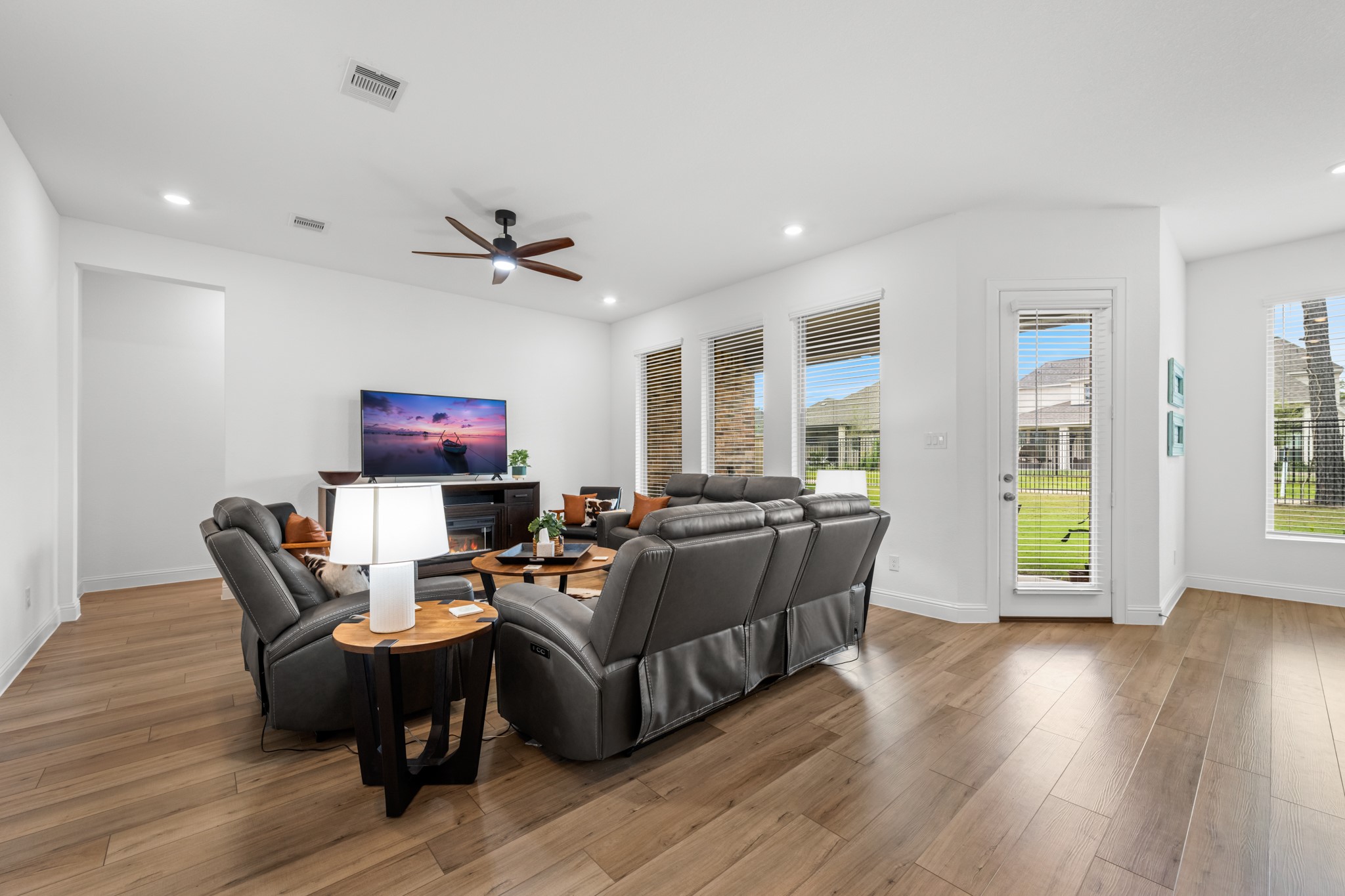 22014 Gateway Arch Drive Porter, TX 77365 - Photo 14 of 27 a living room with furniture and a wooden floor
