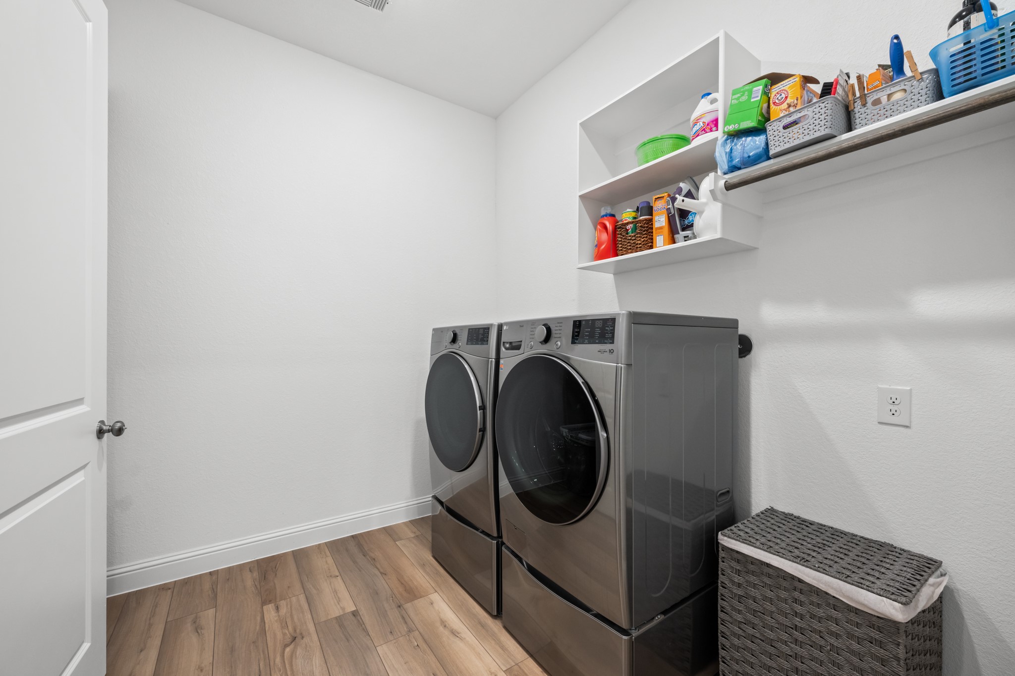 22014 Gateway Arch Drive Porter, TX 77365 - Photo 19 of 27 a utility room with dryer and washer