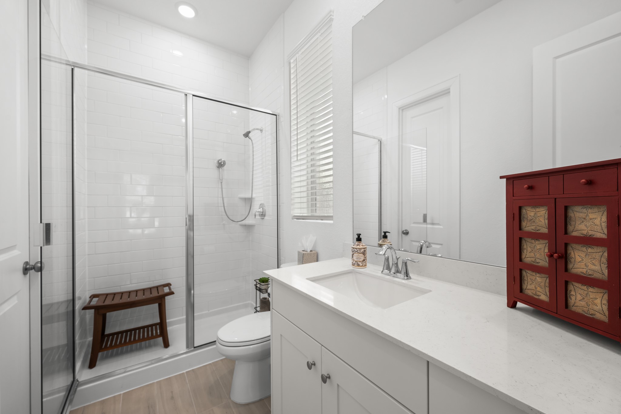 22014 Gateway Arch Drive Porter, TX 77365 - Photo 7 of 27 a bathroom with a sink a toilet and shower