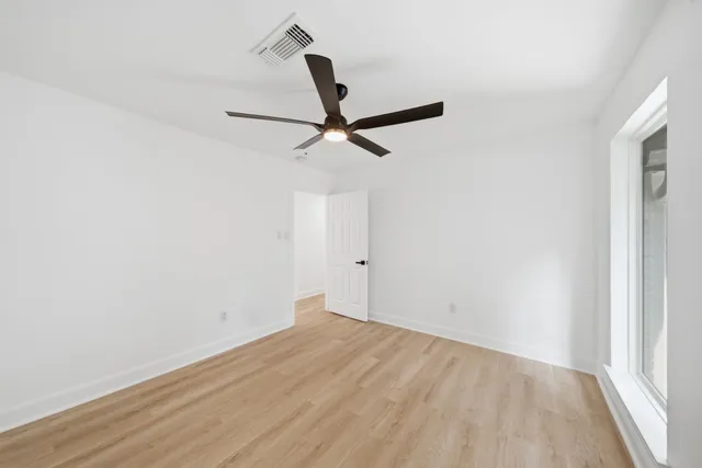 a view of a big room with wooden floor