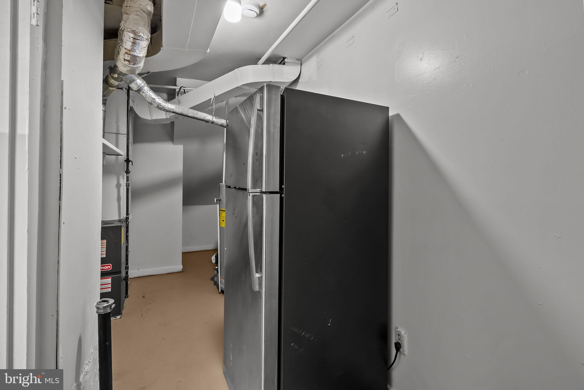 5708 Mitchell Road Levittown, PA 19057 - Photo 16 of 23 a close view of a refrigerator in kitchen