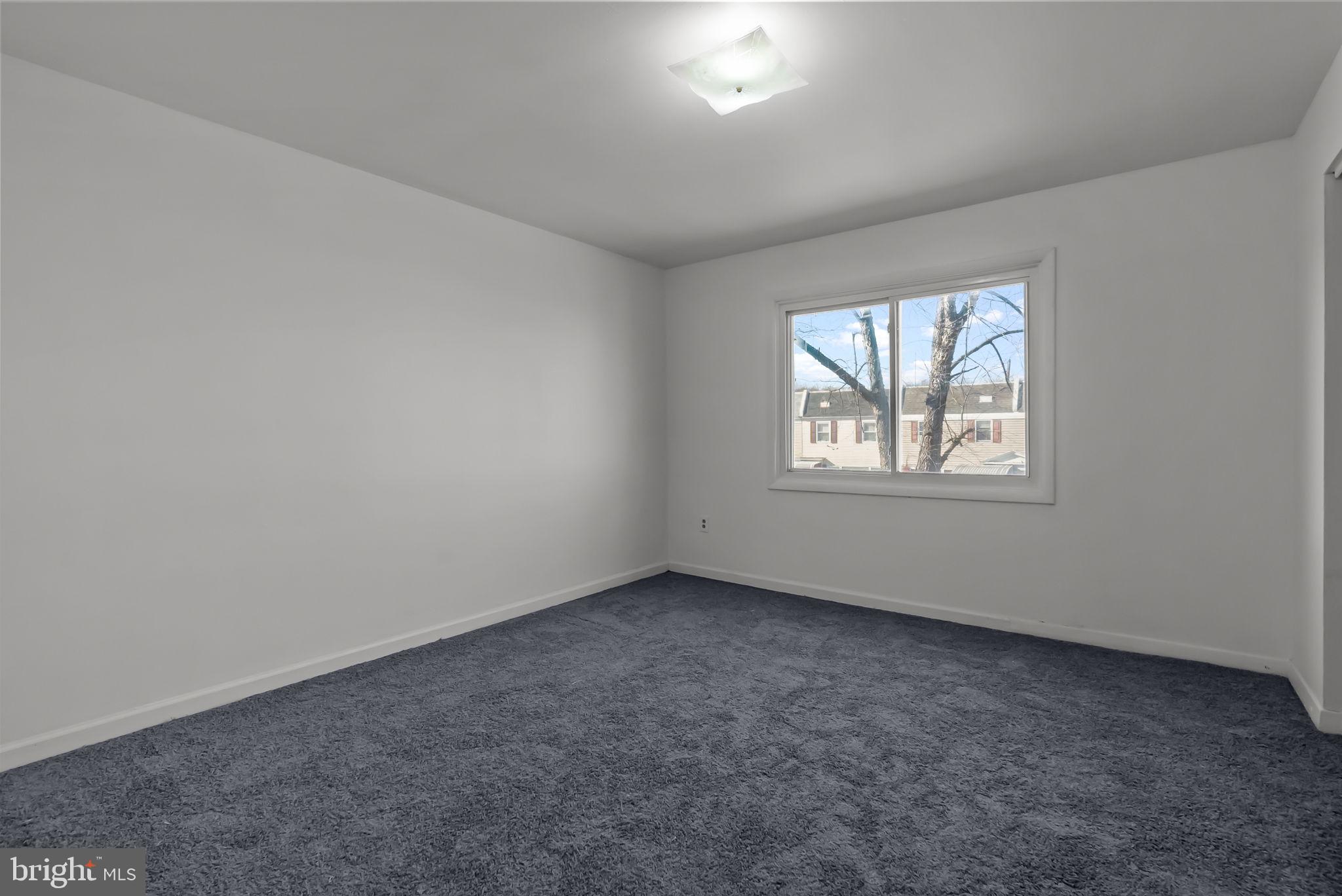 5708 Mitchell Road Levittown, PA 19057 - Photo 20 of 23 an empty room with windows