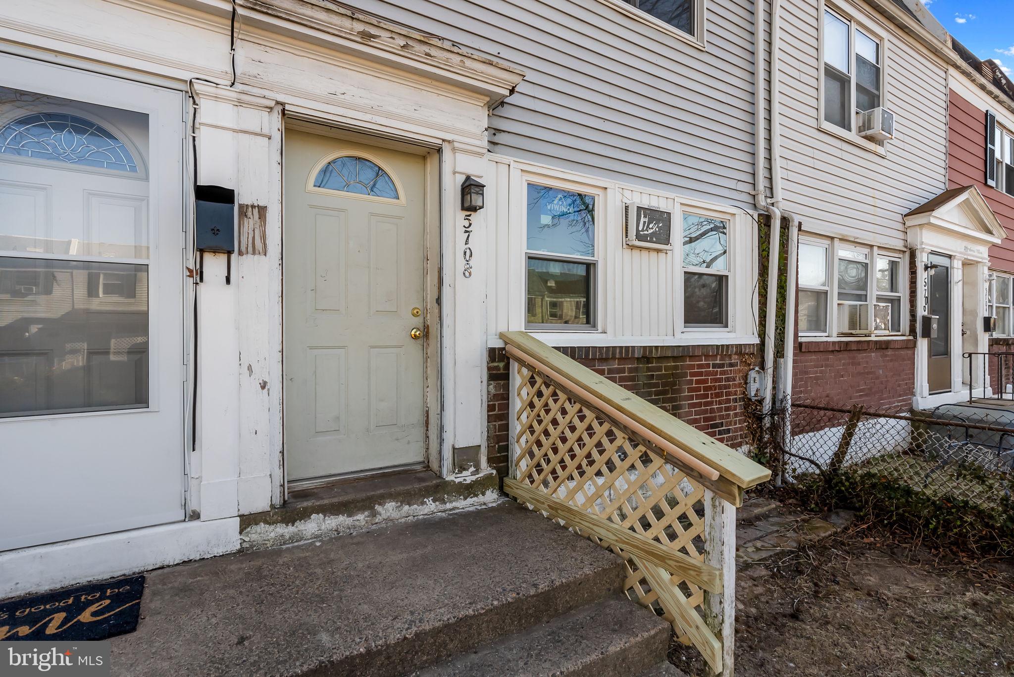5708 Mitchell Road Levittown, PA 19057 - Photo 7 of 23 a view of a house with a wooden fence