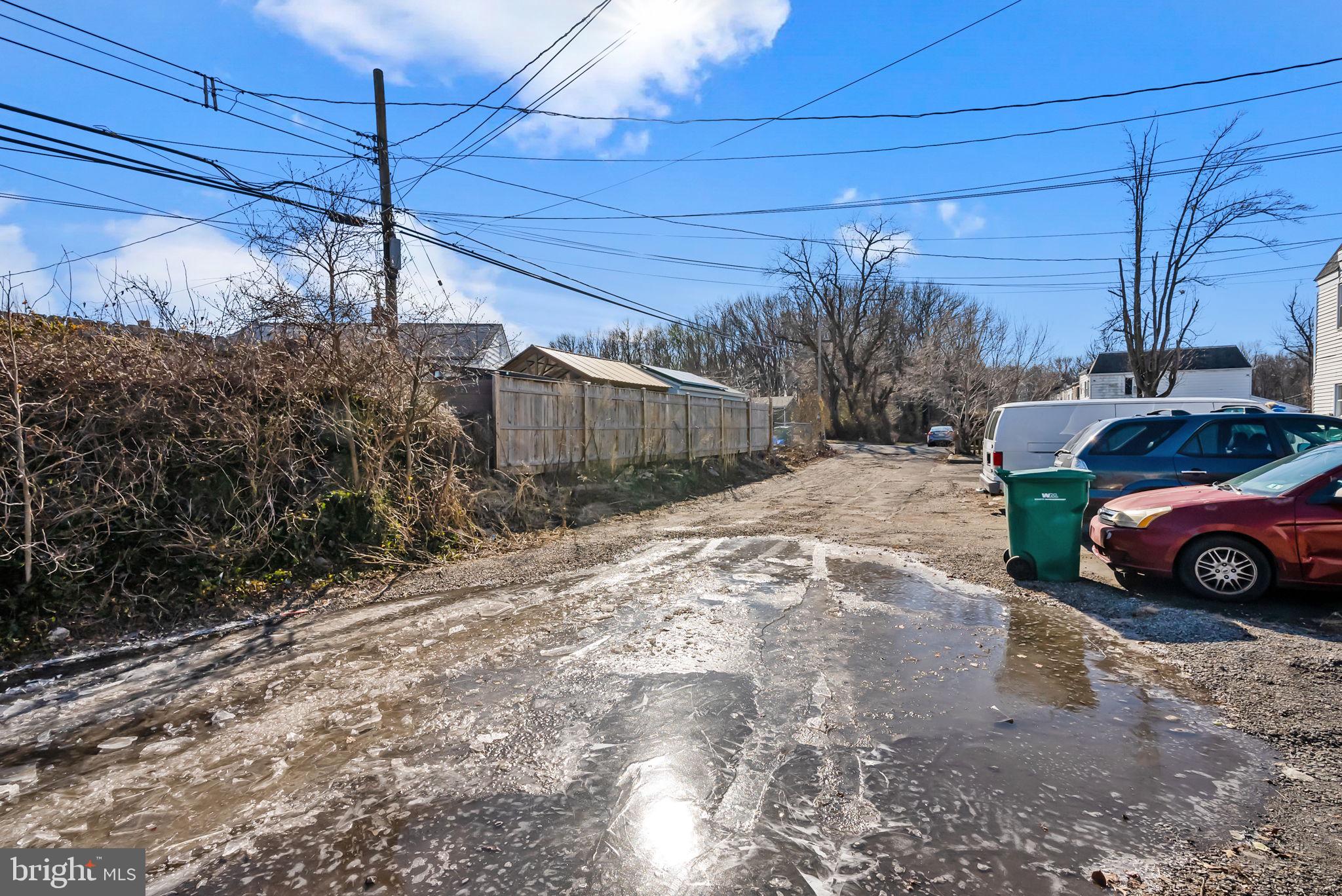 5708 Mitchell Road Levittown, PA 19057 - Photo 9 of 23 a view of a car in front of house