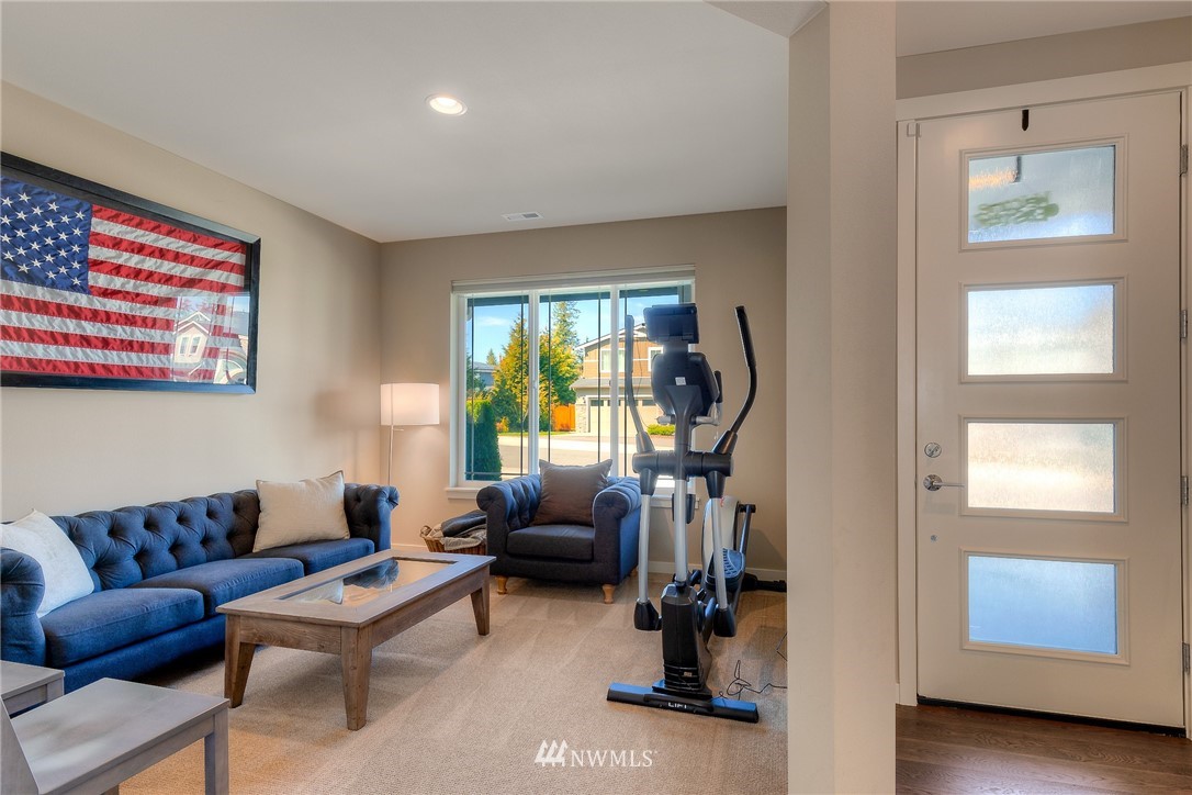 26 175th Place Southwest Bothell, WA 98012 - Photo 2 of 27 a living room with furniture and a window
