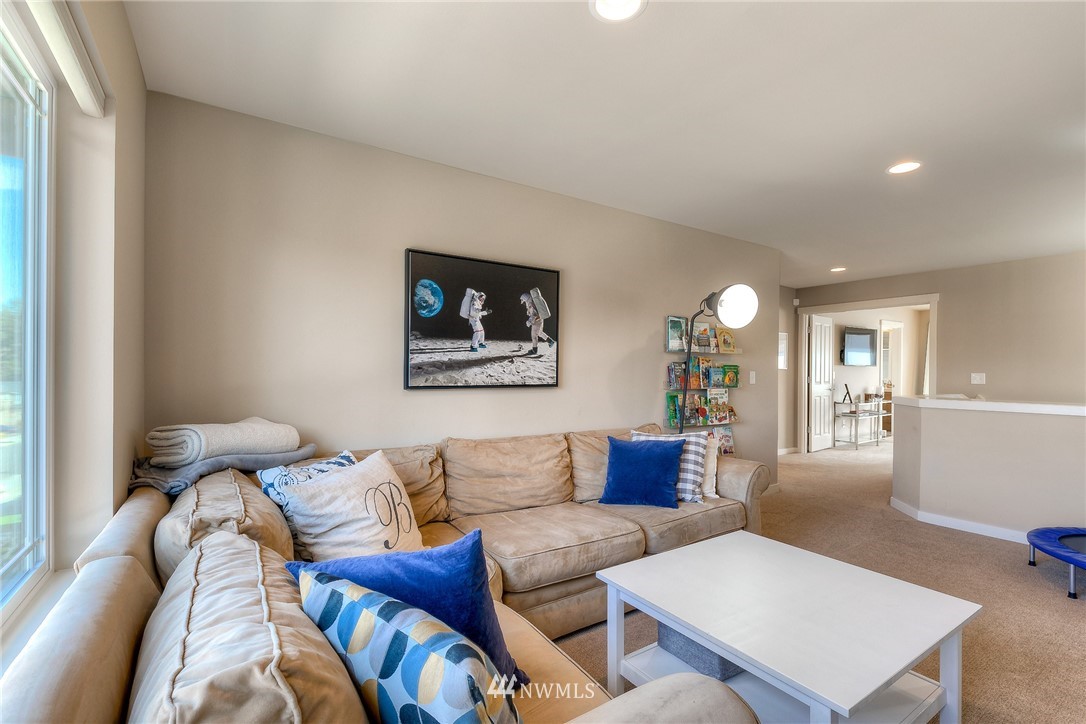26 175th Place Southwest Bothell, WA 98012 - Photo 13 of 27 a living room with furniture and a couch