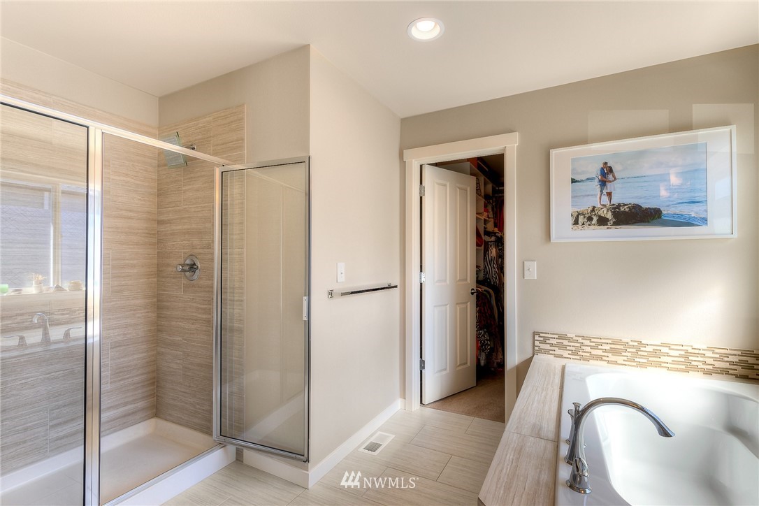 26 175th Place Southwest Bothell, WA 98012 - Photo 18 of 27 a bathroom with a shower and mirror