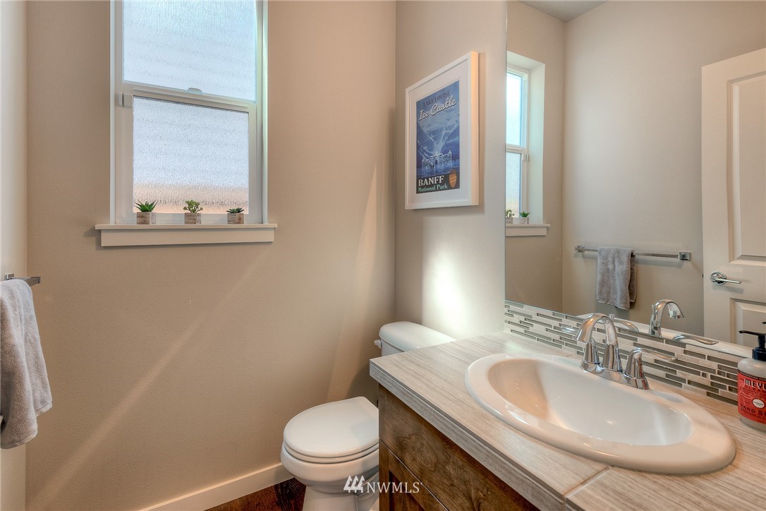 26 175th Place Southwest Bothell, WA 98012 - Photo 3 of 27 a bathroom with a toilet sink and mirror