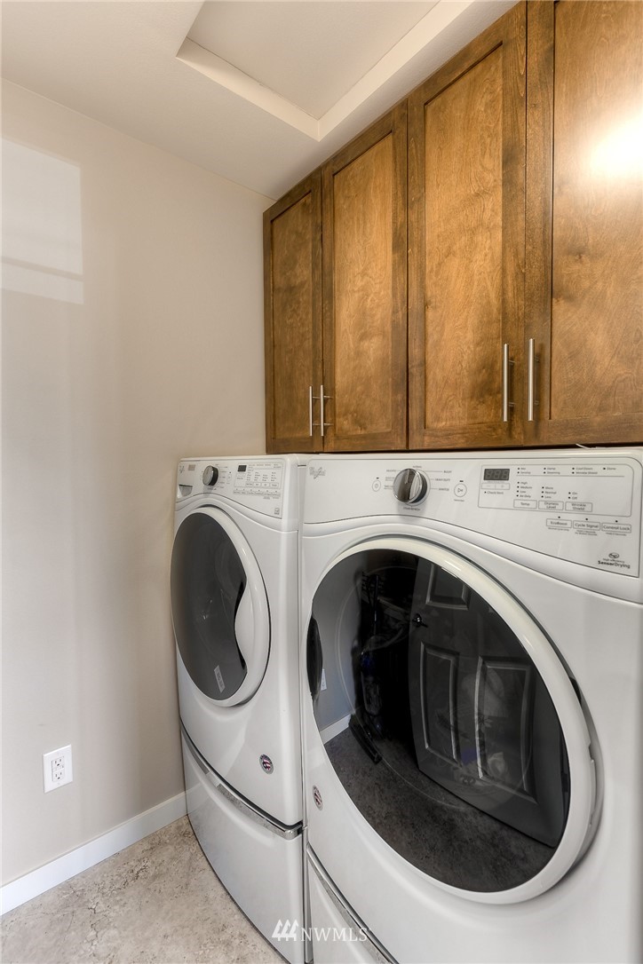26 175th Place Southwest Bothell, WA 98012 - Photo 21 of 27 a utility room with dryer and washer