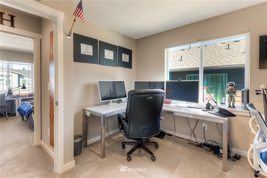 26 175th Place Southwest Bothell, WA 98012 - Photo 25 of 27 a view of a workspace with furniture and a window