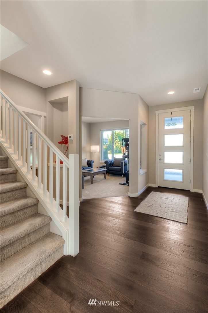 26 175th Place Southwest Bothell, WA 98012 - Photo 4 of 27 a view of an entryway with wooden floor