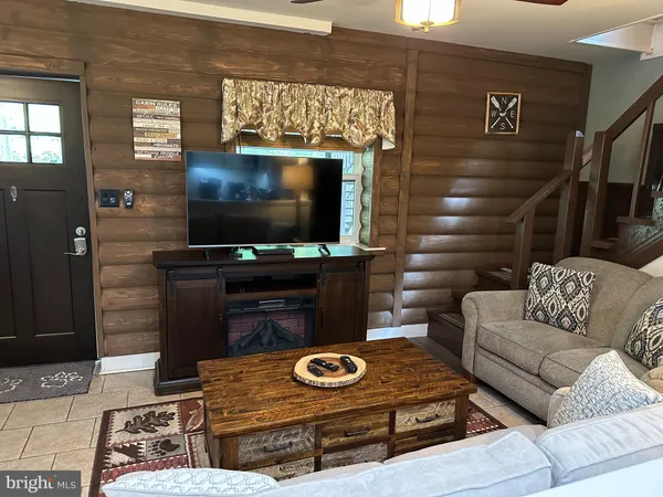 a view of a livingroom with couch and furniture