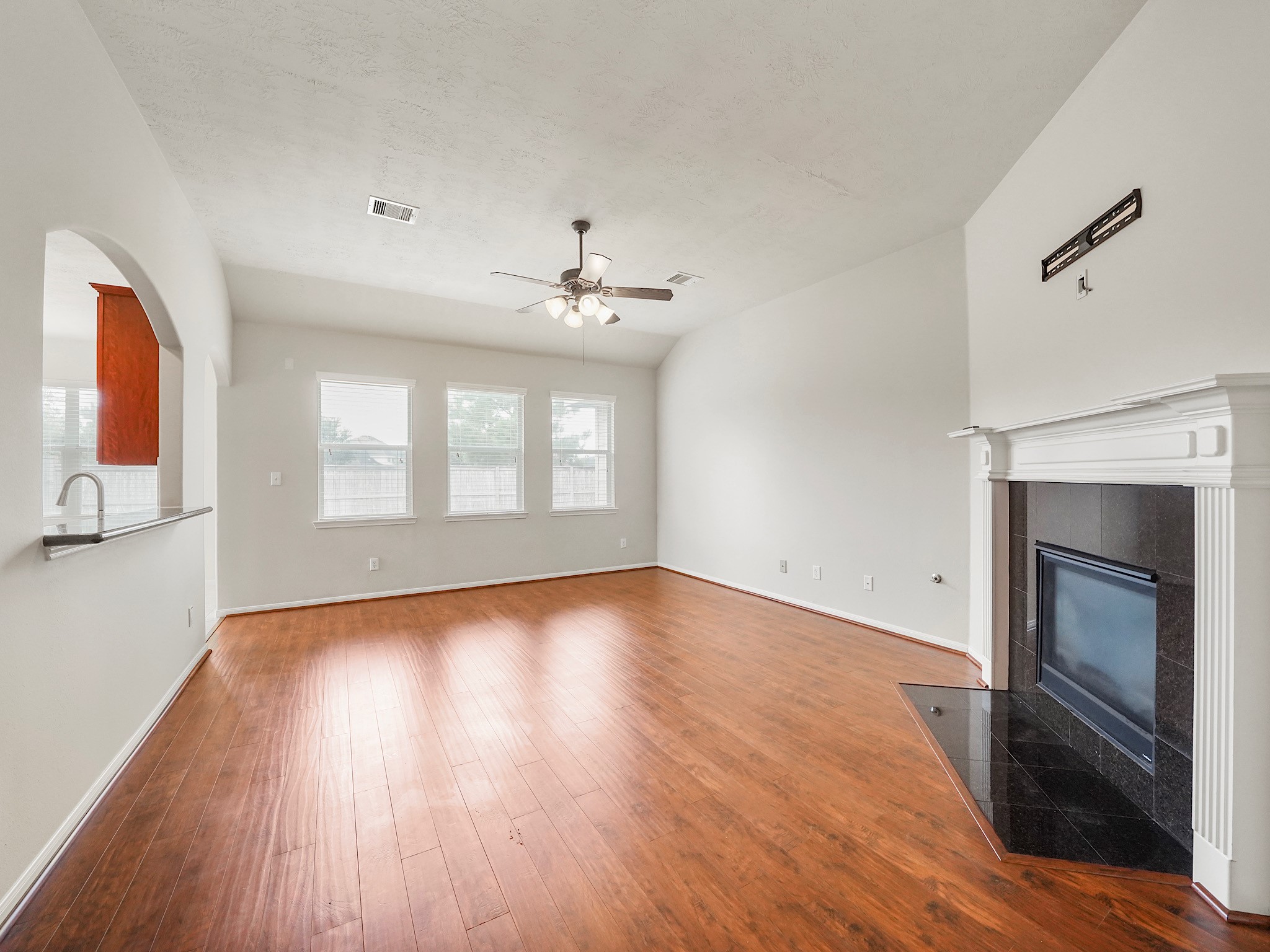 3218 Bandera Run Lane Katy, TX 77494 - Photo 4 of 15 Spacious living room welcomes large furniture for cozy gatherings and relaxation!