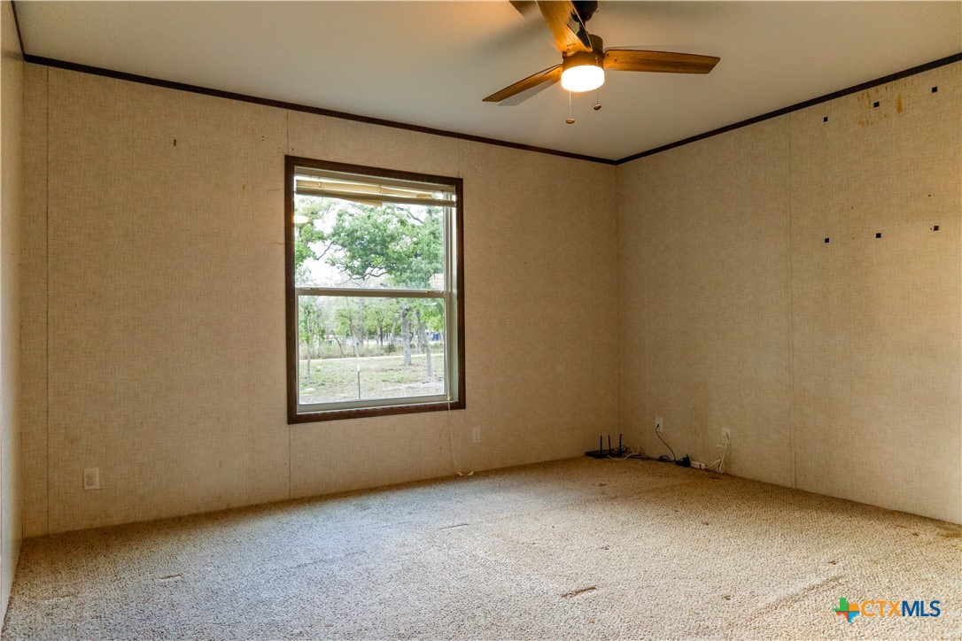 293 Turkey Tree Trail Seguin, TX 78155 - Photo 5 of 9 a view of an empty room with a window