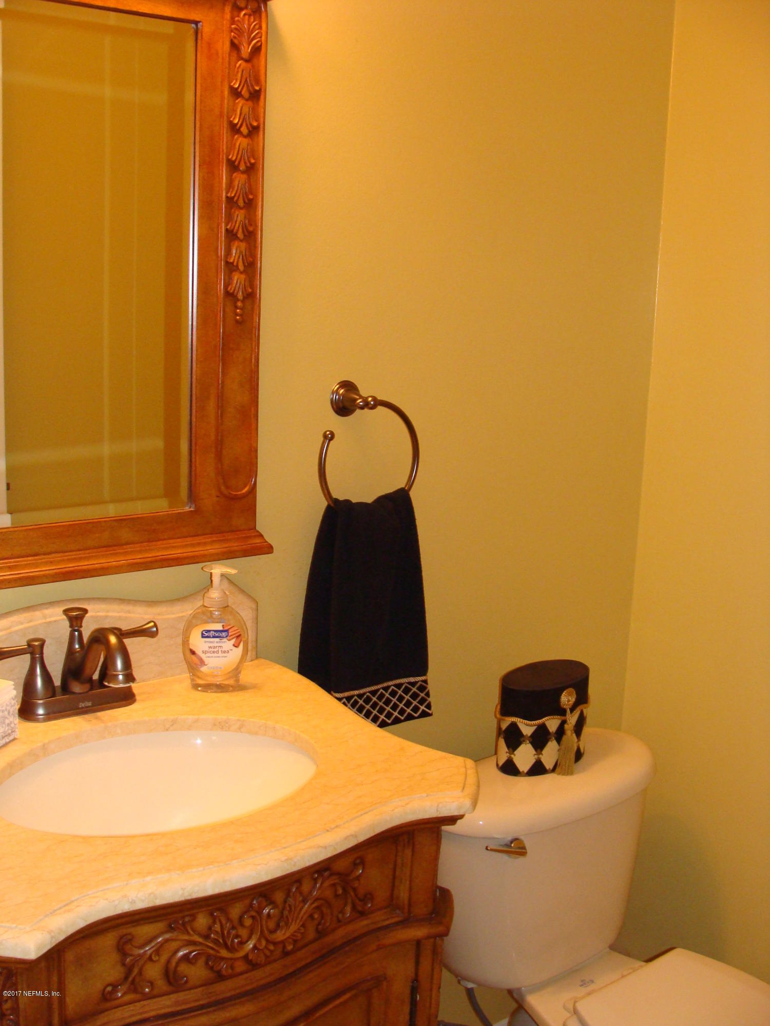 632 Pelham Road St. Augustine, FL 32092 - Photo 8 of 24 a bathroom with a sink and a toilet