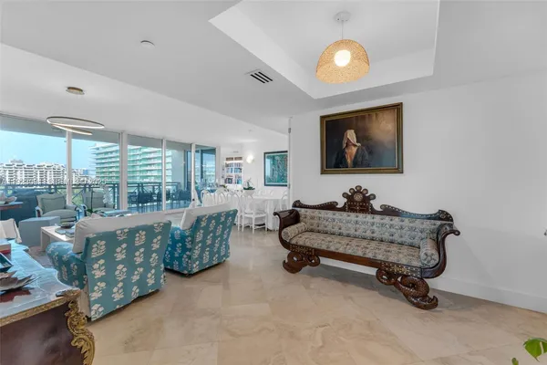 a bedroom with a large bed and a couch