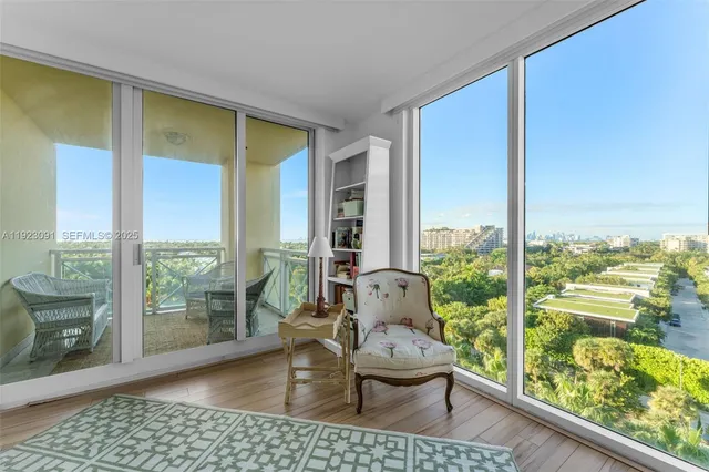 a large bathroom with a double vanity sink large mirror and a bathtub