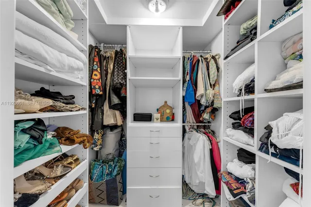 a view of a balcony with furniture