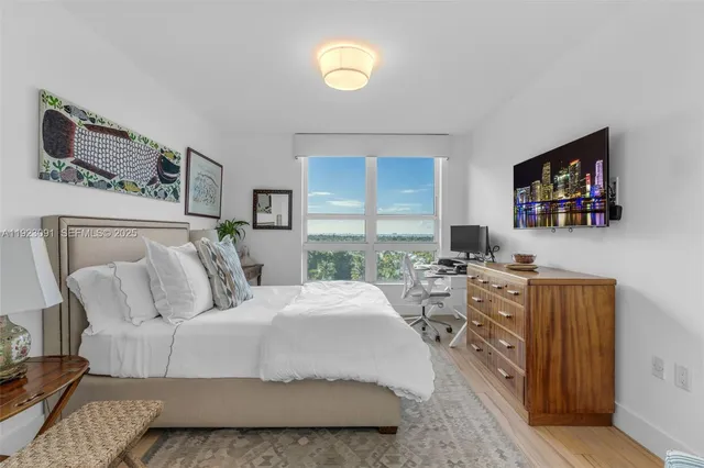 a room with a window and couch